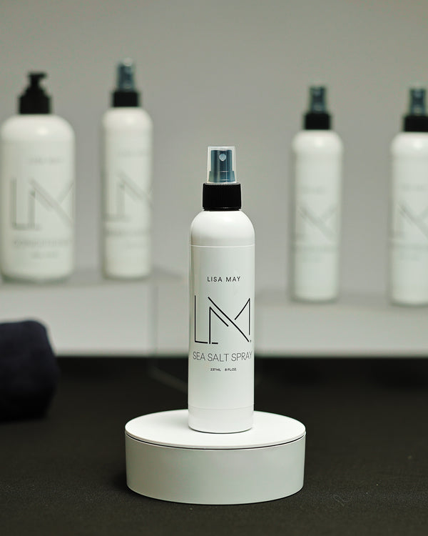 Lisa May Eco Hair Care Sea Salt Spray in a white bottle with a fine-mist sprayer