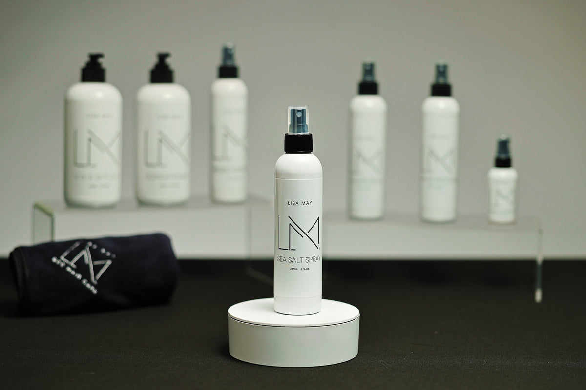 Lisa May Eco Hair Care Sea Salt Spray in a white bottle with a fine-mist sprayer