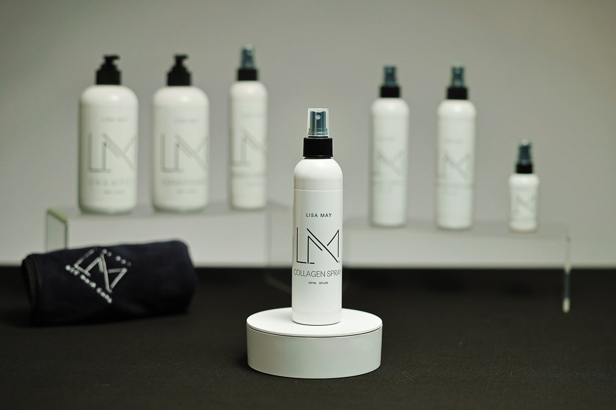 Lisa May Eco Hair Care Collagen Spray in a white mist-spray bottle